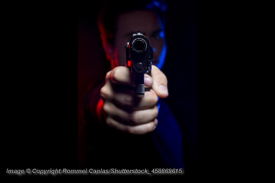 Gun Pointed at Viewer - PhoGun Pointed at Viewer - Photo: © Copyright Rommel Canlas/Shutterstockto: © Copyright Rommel Canlas/Shutterstock
