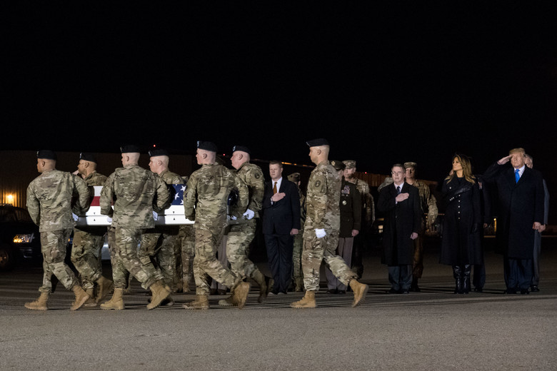 A U.S. Army carry team transfers the remains of Chief Warrant Officer 2 Kirk T. Fuchigami of Keaau, Hawaii, during a dignified transfer Nov. 21, 2019, at Dover Air Force Base, Del. Fuchigami was assigned to 1st Battalion, 227th Aviation Regiment, 1st Air Cavalry Brigade, 1st Cavalry Division, Fort Hood, Texas. (U.S. Air Force photo by Roland Balik)