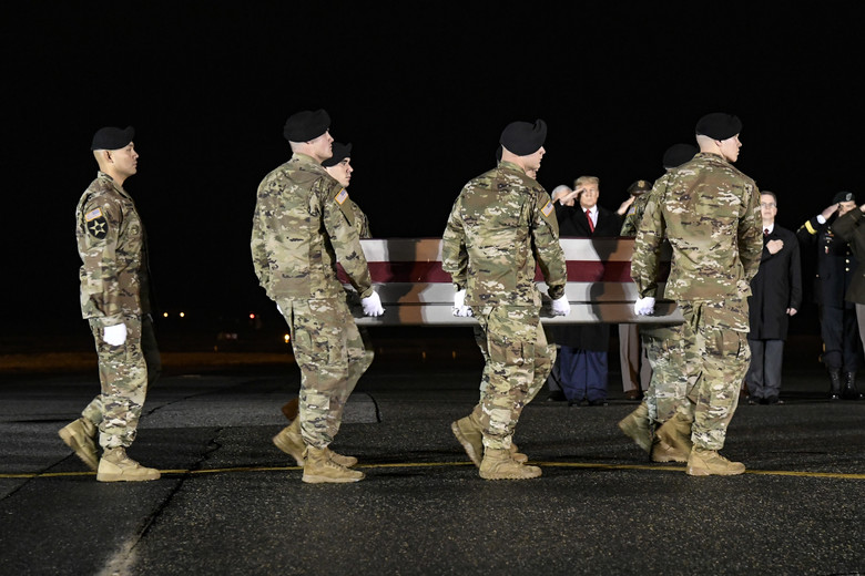 A U.S. Army carry team transfers the remains of Sgt. 1st Class Javier J. Gutierrez, of San Antonio, Texas, Feb. 10, 2020 at Dover Air Force Base, Del. Gutierrez was assigned to the 3rd Battalion, 7th Special Forces Group (Airborne), Eglin Air Force Base, Fla. (U.S. Air Force Photo by Senior Airman Eric M. Fisher)