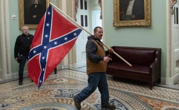 FBI photo of man with Confederate flag at US Capitol