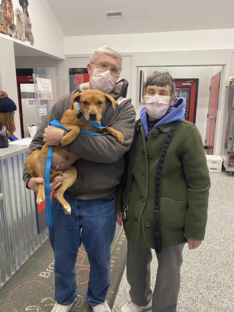 Rehoboth Beach Mayor Stan Mills and his wife Marcia Maldeis pose with Minnie, their shelter dog. Photo courtesy of Brandywine Valley SPCA