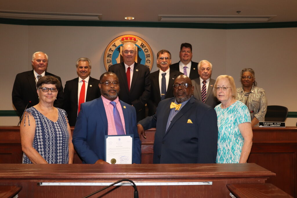 June 15, 2021, the Commissioners joined with Ivory Smith, president of the Worcester County Branch of the National Association for the Advancement of Colored People, and other NAACP members to recognize June 19 as Juneteenth in Worcester County. On June 19, 1865, two-and-one-half years after President Abraham Lincoln signed the Emancipation Proclamation, enslaved people in Texas and other remote slave states were finally informed that they were free people. This date, which has come to be recognized as Juneteenth, is representative of similar struggles for freedom and equality that are taking place throughout our nation and the world. Juneteenth both signifies a formal end of slavery in the United States and serves as a call to action for each of us to elevate civility, to replace injustice with justice and equality, and to work together to end human trafficking and modern-day slavery.