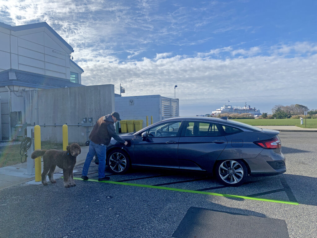 Terry Anstead, Customer Service Manager at the Ferry, charges his 2019 Honda Clarity Plug-In Hybrid at one of the new EV charging stations at the Cape May Ferry Terminal.