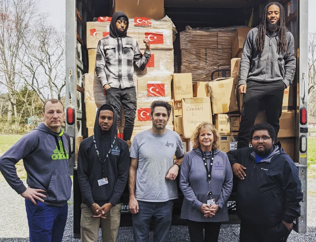 : Atlantic General Hospital’s Materials Management Department staff work with Ryan Nellans and other volunteers to load $30,000 worth of donated medical supplies bound for Ukraine.