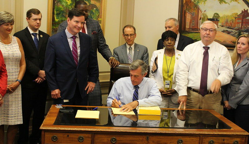 Governor John Carney signed the Delaware FY '23 operating budget Tuesday (photo courtesy of the Office of Gov. John Carney)