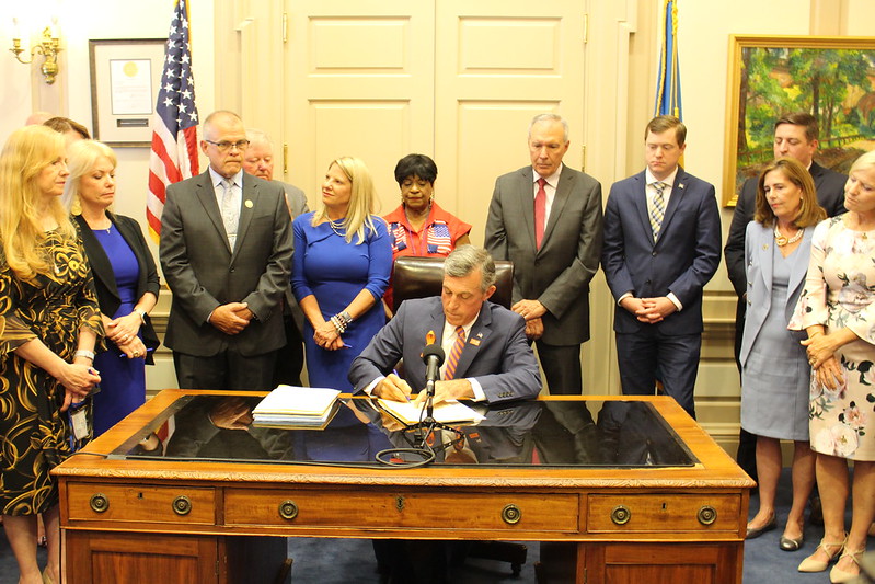 Gov. John Carney Thursday signed six gun-related bills into law (photo courtesy of the Office of Gov. John Carney)