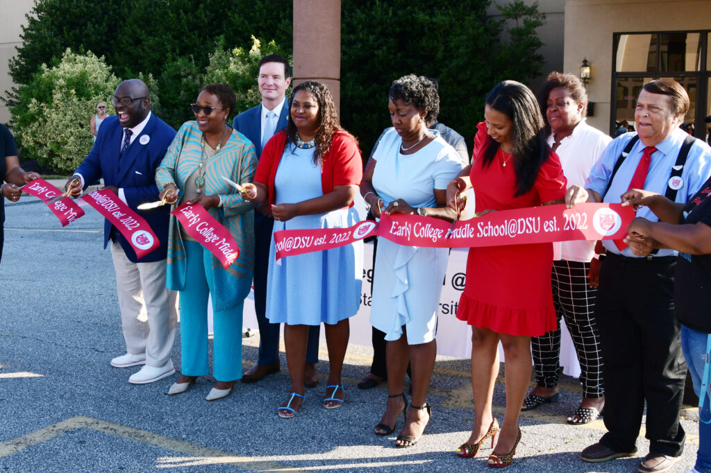 (L-r) University President Tony Allen, ECS Board President Dr. Marsha Horton, ECS Head of School Dr. Evelyn Edney, Associate Principal Dr. Dara Savage, Principal Nyia McCants and Dover Mayor Robin Christensen cut the ribbon to launch the Early College Middle School. Photo courtesy of Delaware State University