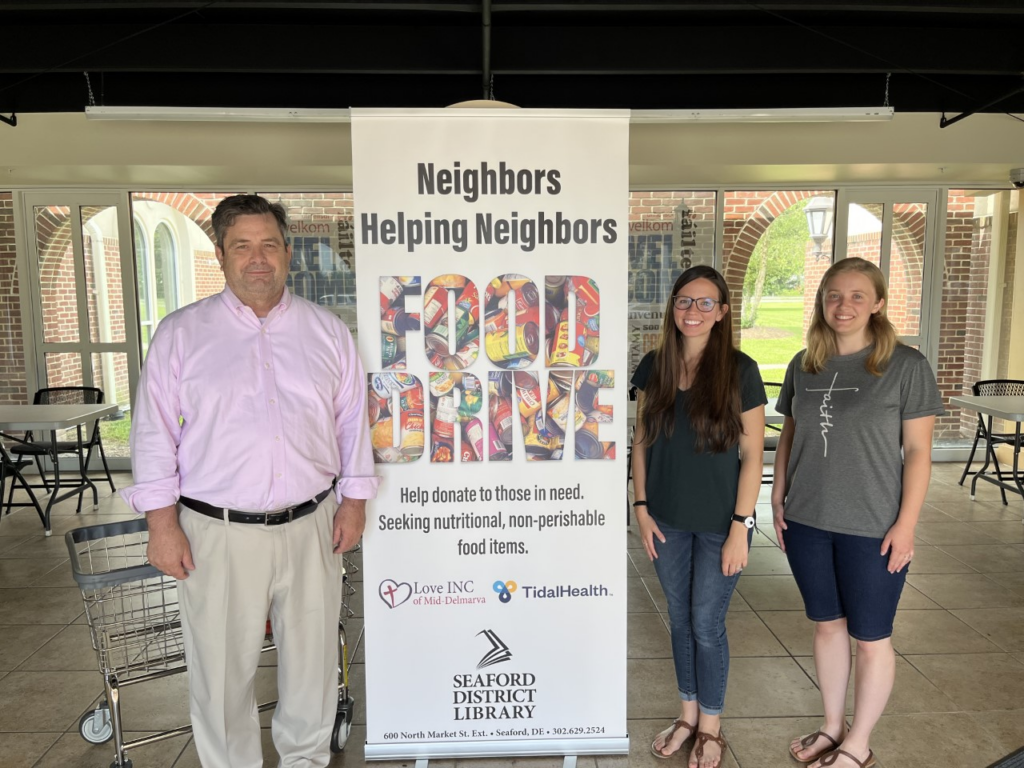 Jerry Keiser (Seaford Library), Kathryn Alban (Transformational Ministries Director), Kaila Miller (Ministries Coordinator) are proud to be partnering to help those in need in the Seaford area.