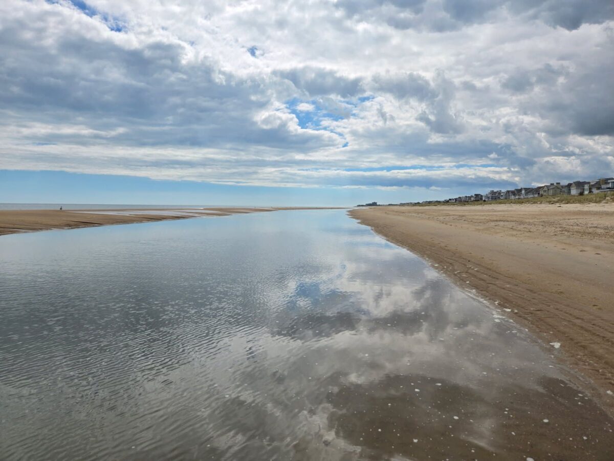 Reflections in a tidal pool at Bethany Beach