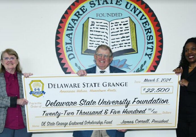 Delaware State Grange representatives Debbie Edwards (secretary) & Jimmy Correll (president) present a symbolic check representing their newly established endowment to Dean Cherese Winstead Casson of the DSU College of Agriculture, Science and Technology
