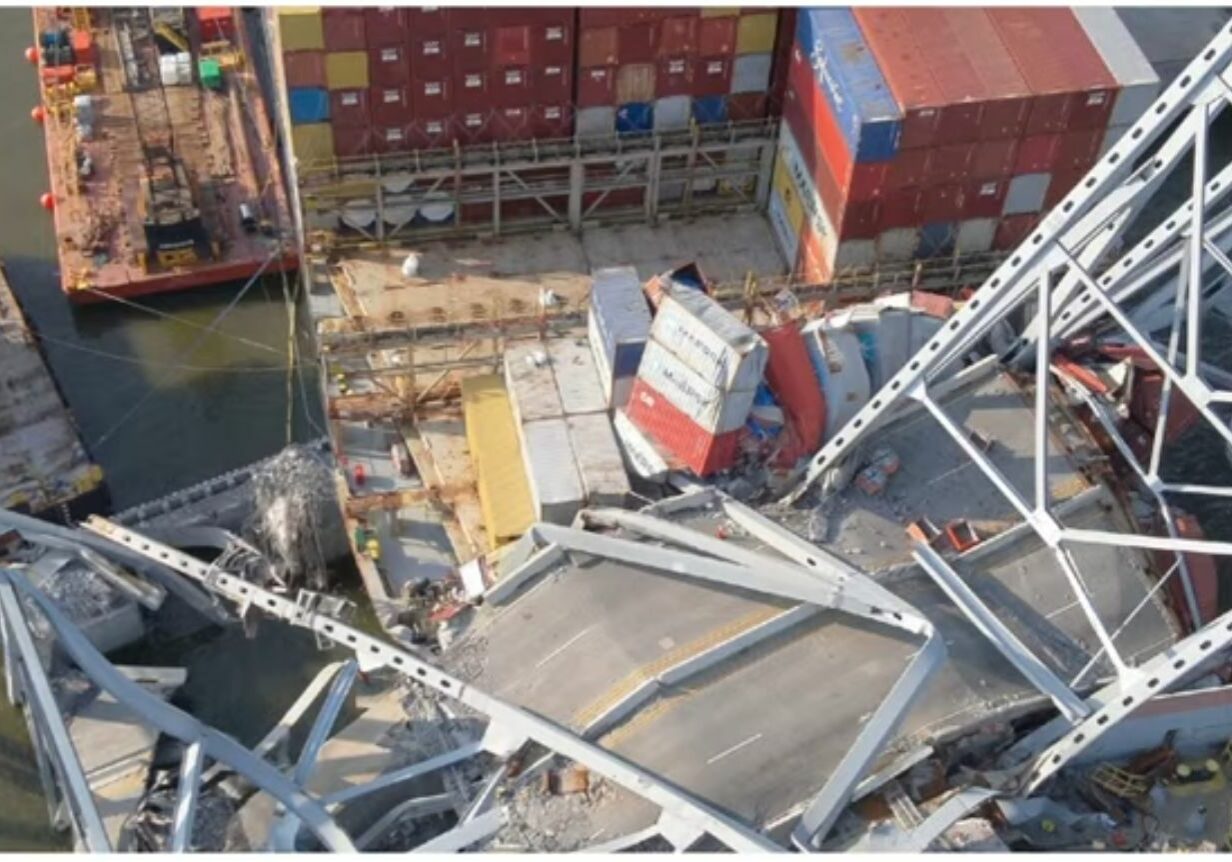 Aerial view of the bow of the M/V Dali with a section of Key Bridge and roadway across the bow / Image courtesy Key Bridge Response/State of Maryland