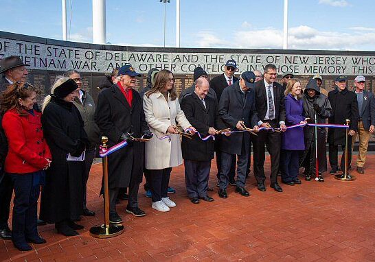 Ribbon Cutting at dedication of Wall of Remembrance Memorial at  Veterans Memorial Park in New Castle / Image courtesy DRBA