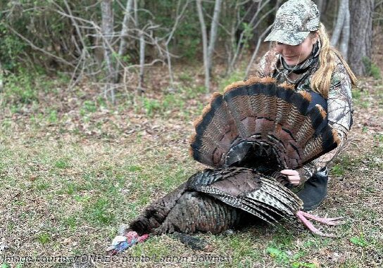 Brixi, a young turkey hunter, with her first Delaware gobbler harvested during a recent season /Delaware DNREC photo by Lauryn Downes