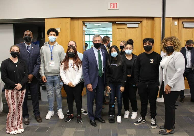 Governor John Carney gathered with students and others at Delaware Tech in Wilmington, where a $50-million ARPA job training investment was announced. (photo courtesy of Governor Carney's office)