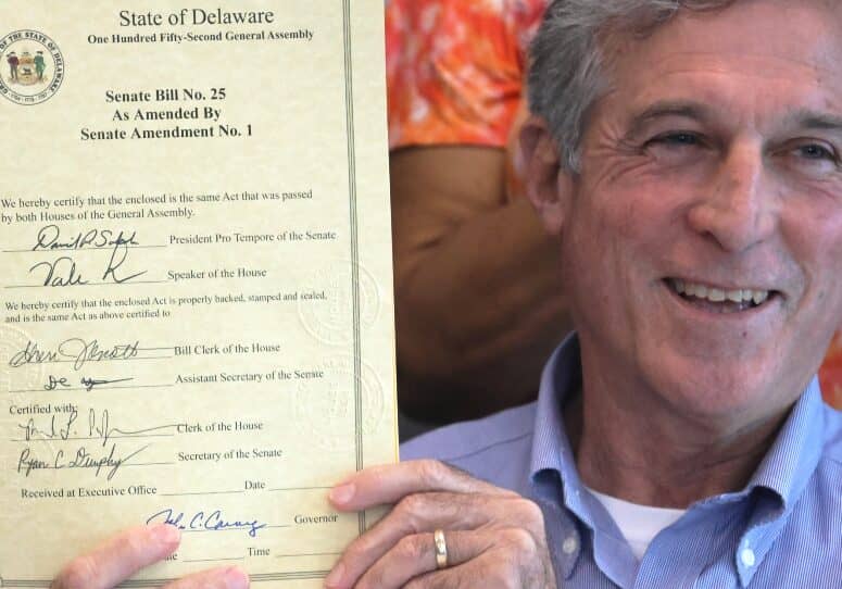 Bill signed by Delaware Governor John Carney. Image courtesy WGMD/Alan Henney