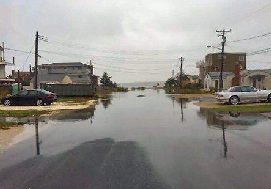 Archive Image:  Bay flooding Reed Street in Dewey / Image © TOD/TJ