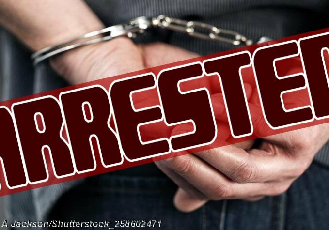 Arrested-Handcuffs-behind-back_Shutterstock_258602471