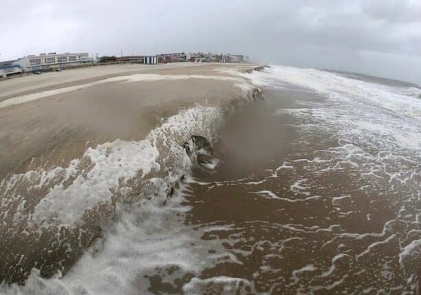 This photo was taken near Funland around 9:25 a.m. as the storm blew across Delmarva. The rough surf ate away at the beach leaving a cliff.  Image courtesy Bill Henschke.