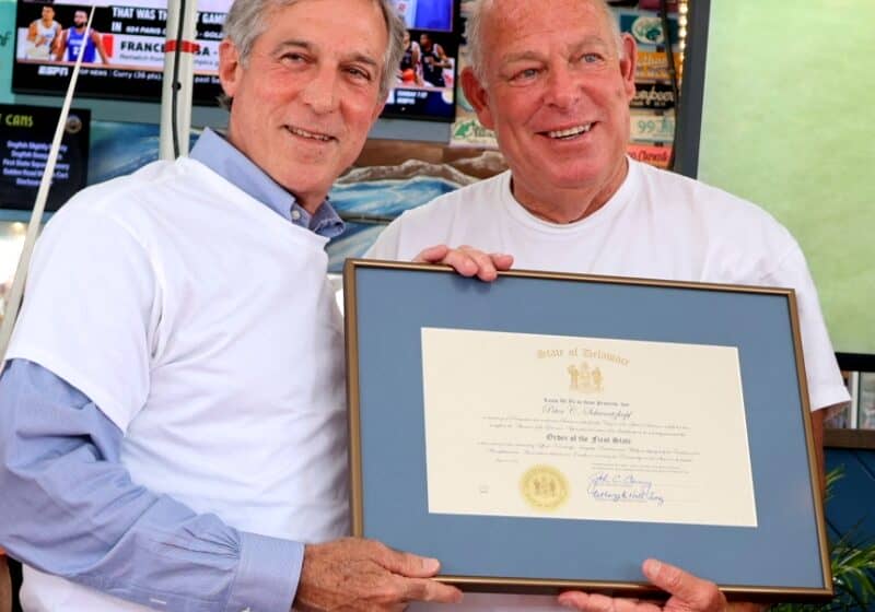 Governor John Carney recognizes Rep. Peter Schwartzkopf for his years of public service. Image courtesy WGMD/Alan Henney
