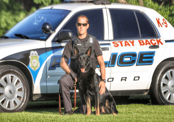 Milford Police Cpl. Timothy Webb is pictured with the late K-9 Henk in 2017. (photo courtesy of Milford Police)