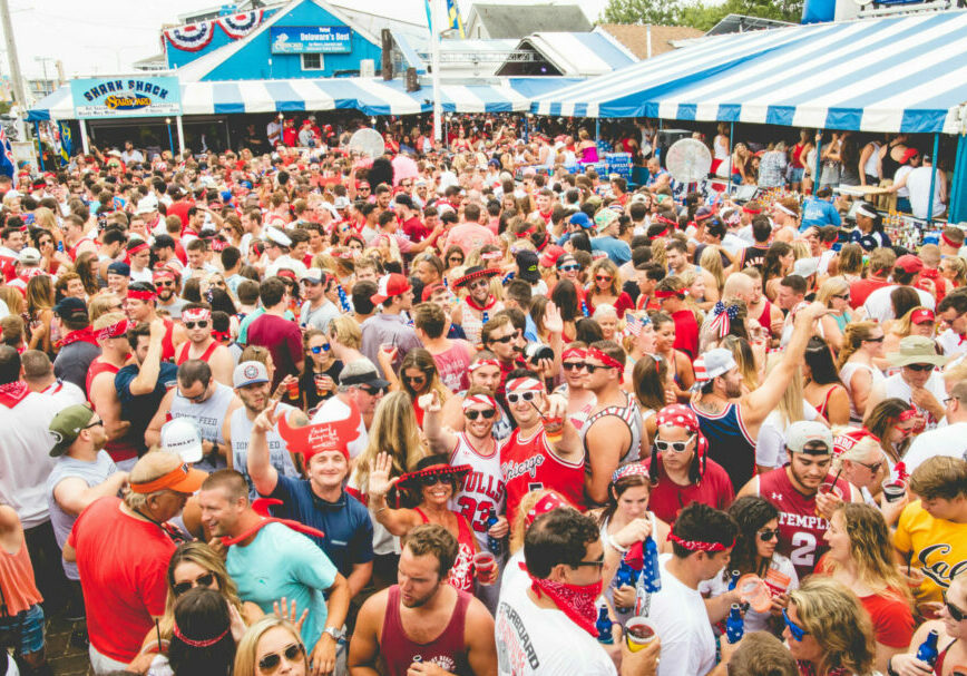 A crowd at a past Running of the Bull in Dewey Beach - photo courtesy of The Starboard