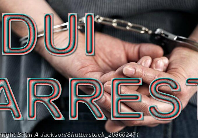 Handcuffs-behind-back - Photo: © Brian A Jackson/Shutterstock