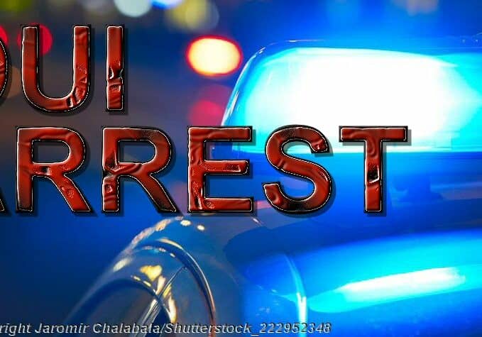 DUIArrest-Blue-Police-Car-Light - Photo © Jaromir Chalabala/ Shutterstock_222952348.jpg