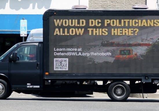 Environmentalists from the Louisiana Bucket Brigade came to the Rehoboth Beach Bandstand early Tuesday afternoon to voice their concerns regarding the fossil fuel industry which is proposing to build new liquefied natural gas (LNG) terminals along the Louisiana coast. Image courtesy WGMD/Alan Henney