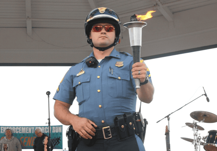 The Flame of Hope left the Rehoboth Bandstand Wednesday night on a 3-day, 160-mile journey to Newark. Image courtesy WGMD/Alan Henney.