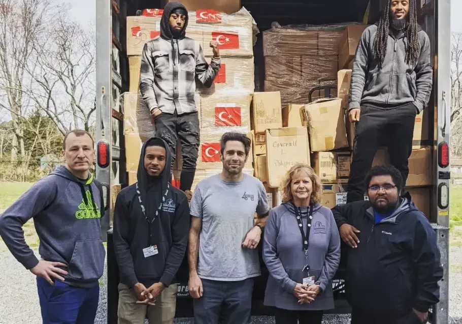 : Atlantic General Hospital’s Materials Management Department staff work with Ryan Nellans and other volunteers to load $30,000 worth of donated medical supplies bound for Ukraine.