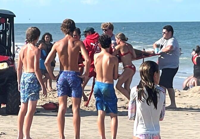 One of the few people taken to a hospital this past holiday weekend from the beach in Rehoboth was this 26-year-old man who dislocated or broke his knee after he was struck by a wave in the surf around 5 p.m. on Sunday off Laurel Street. He was taken to the hospital by ambulance after being treated initially by Rehoboth Beach lifeguards. Photo courtesy Evan Stoddard