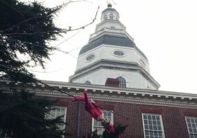 MD Capitol with Christmas Elf