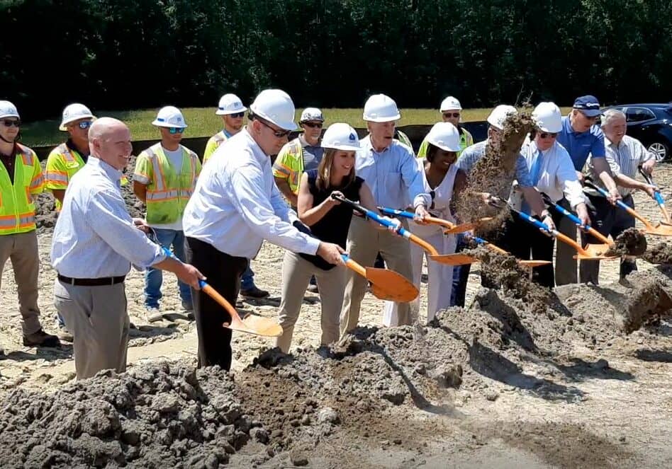 Front row:  Todd Lawson, Sussex County Administrator, State Senator Brian Pettyjohn, DelDOT Secretary Nicole Majeski, US Senator Tom Carper, DelDOT Deputy Secretary Shante Hastings, Sussex County Councilman Doug Hudson, Sussex County Councilman John Rieley, Council President Mike Vincent, former Councilman Sam Wilson