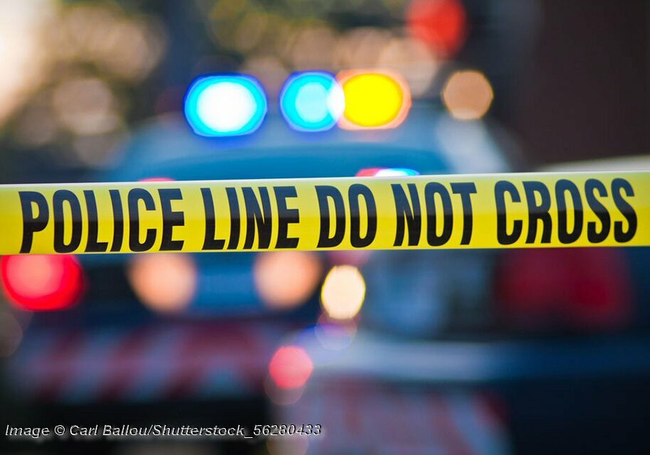 Police line do not cross. Photo © Carl Ballou/Shutterstock Shallow depth of field image taken of yellow law enforcement line with police car and lights in the background. © Carl Ballou/Shutterstock Image © Carl Ballou/Shutterstock_56280433