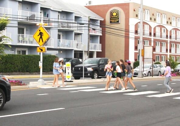 A rectangular rapid flashing beacon (RRFB) and crosswalk in Dewey Beach. Image courtesy WGMD/Alan Henney