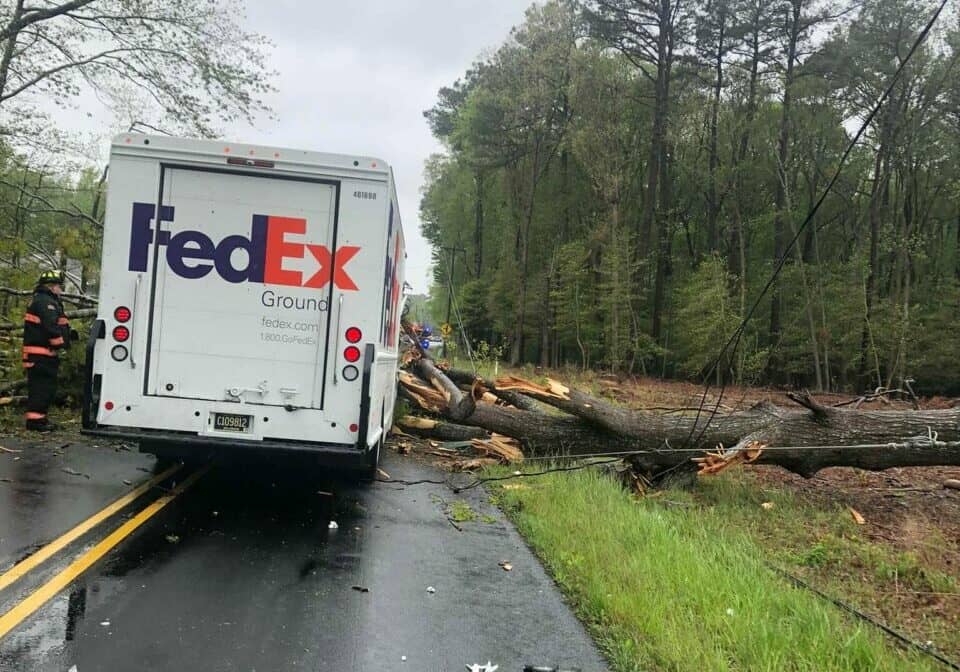Trees and wires fell on a delivery vehicle Sunday (photo courtesy of Roxana Volunteer Fire Company)