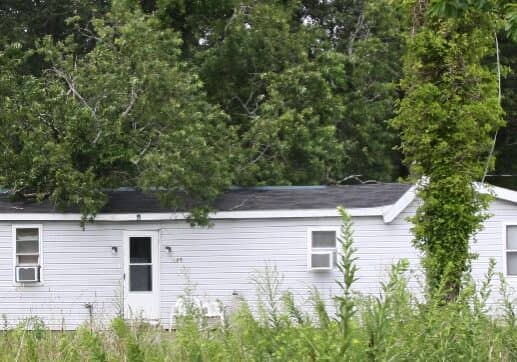 Firefighters responded to this home on Dunbar Street in West Rehoboth around noon after it was struck by the tree.  The 93-year-old male occupant was uninjured but was taken by an ambulance to the hospital because the home was badly damaged and he needed a place to stay.  Image courtesy WGMD/Alan Henney