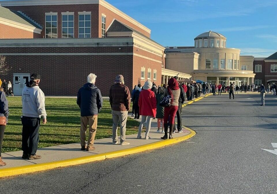 Walt Palmer - Lewes - Voters socially distanced in line at Cape Henlopen High School - waiting to get to cast their ballot in the General Election